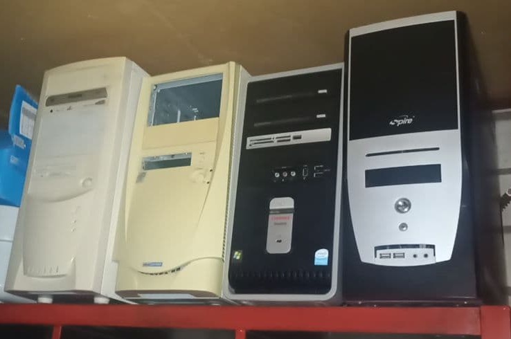 Picture showing 4 computers with out of date designs.